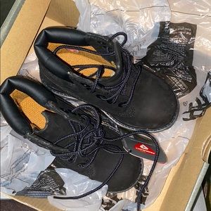 Kids Timberland black boots